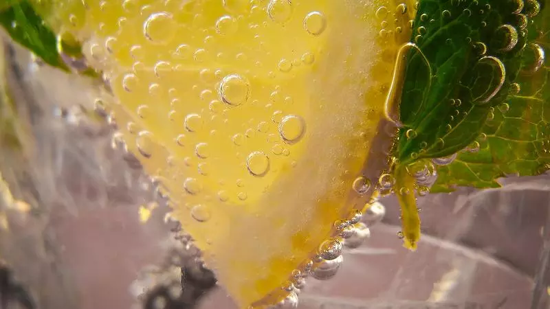 Fpr decoration only: Close up of lemon slice in beverage