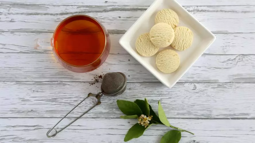 Photo of a cup of tea and biscuits