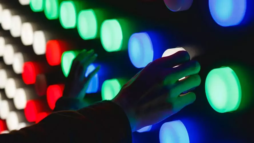 People holding assorted colour led lights