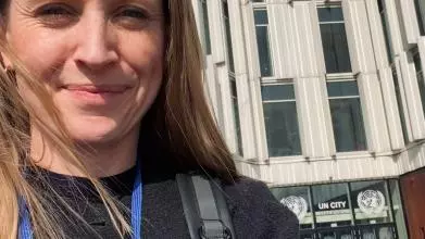 Selfie of Martha Nicholson (the author) in front of the 'UN City Copenhagen'