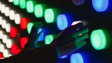 People holding assorted colour led lights
