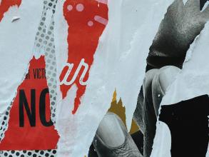 Abstract collage. The author describes it as 'person in black pants and black shoes, standing on snow covered ground'