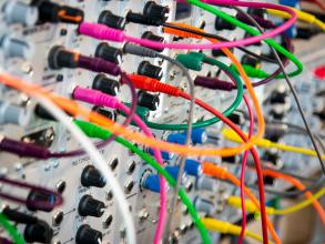 An electric board with connected cables of different colours