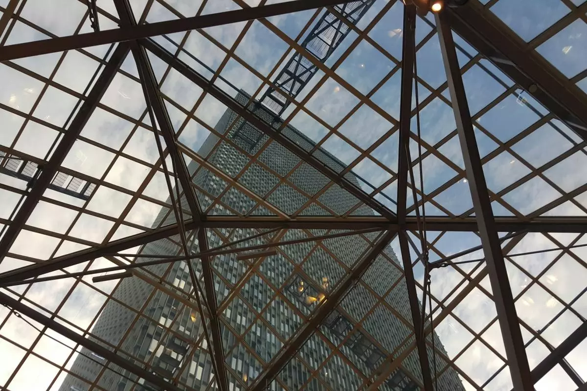 Window pane designs with a skyscraper in the background